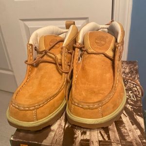 Boys Timberland boots.